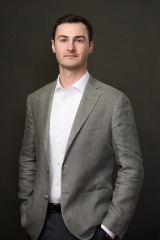 Male professional headshot in studio