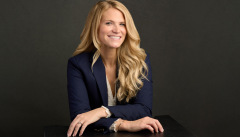 partner headshots on a professional background