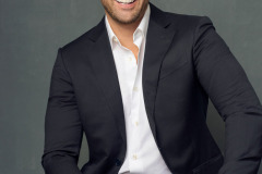 Relaxed smiling headshot photography in studio