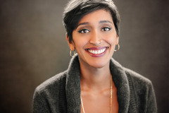 female in studio headshot or textured brown canvas in washington dc by arielle lewis studios photographer