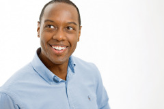 Relaxed casual headshot photography washington DC on white background with a smile
