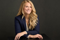 partner headshots on a professional background