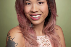 ombre hair female headshot on modern green background in studio at arielle lewis studios in washington dc