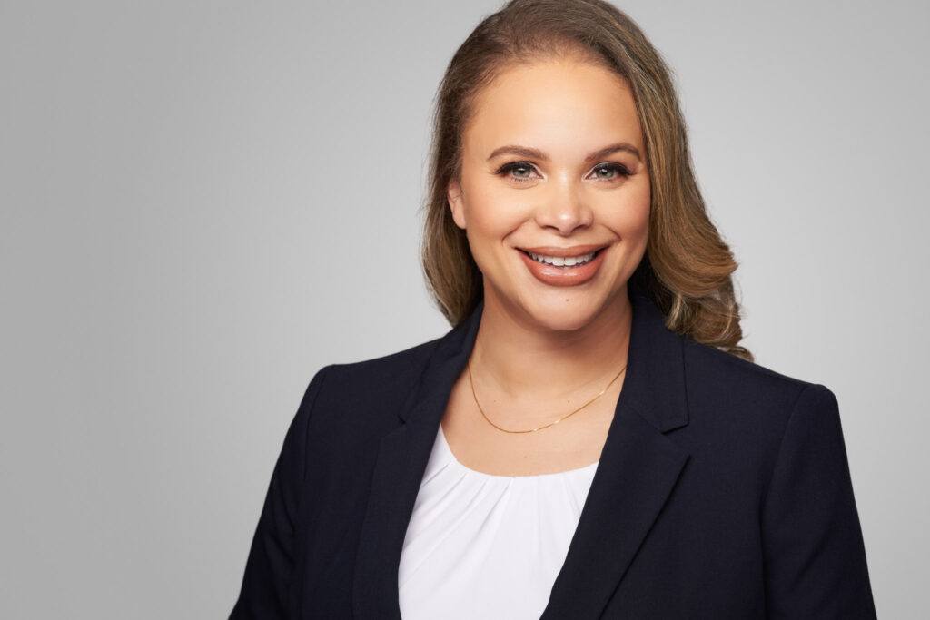 relaxed gentle smile headshot on white background for lobbyist DMV