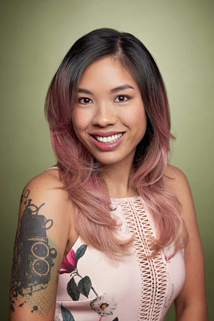 ombre hair female headshot on modern green background in studio at arielle lewis studios in washington dc